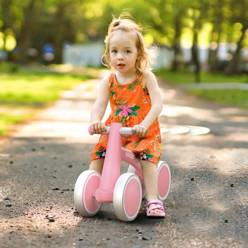 Bicicleta de Equilibrio con cuatro ruedas rosada