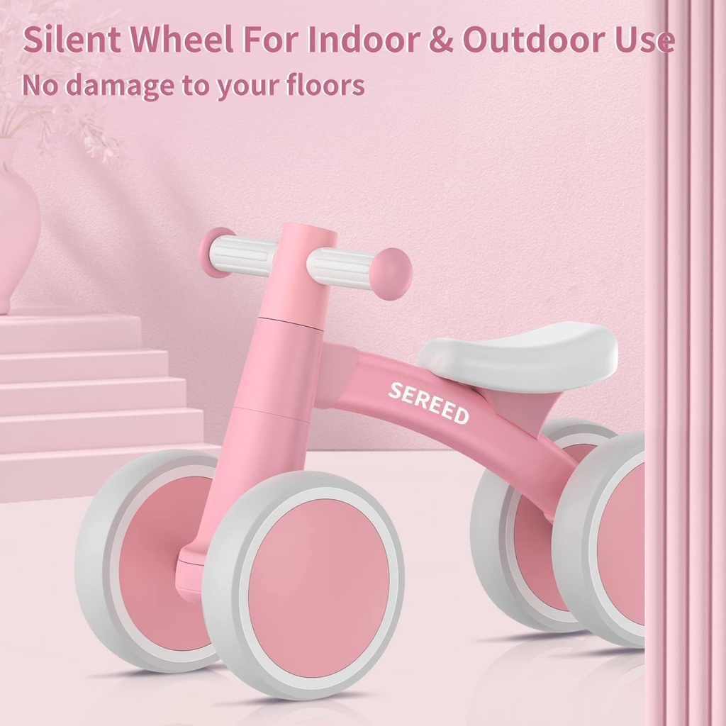 Bicicleta de Equilibrio con cuatro ruedas rosada